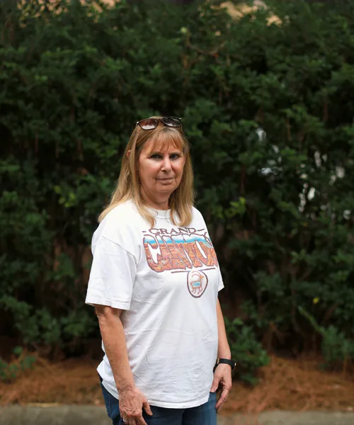 Mobility Concepts crew member in a white T-shirt
